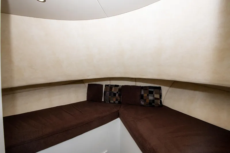Sarah B Yacht Photos Pics Interior cabin of 2007 Custom Carolina 58 Dixon Marine with brown seating and cushions.