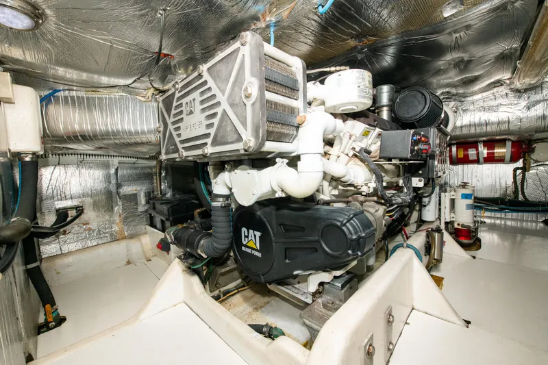 Sarah B Yacht Photos Pics Engine room of 2007 Custom Carolina 58 Dixon Marine, featuring a CAT marine engine.