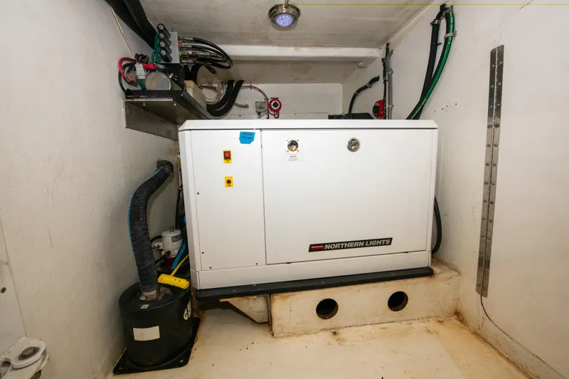 Sarah B Yacht Photos Pics Engine room of 2007 Custom Carolina 58 Dixon Marine with Northern Lights generator.