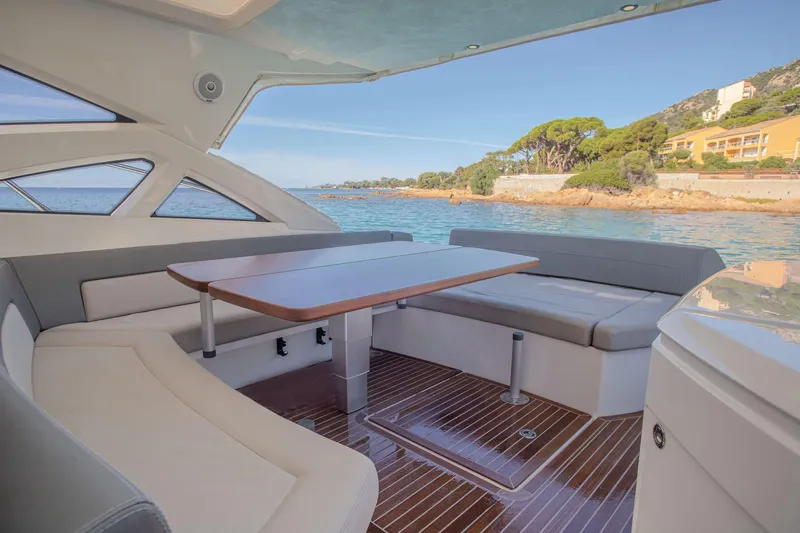 Tyma Yacht Photos Pics Luxurious interior of 2019 Windy 46 Chinook yacht with scenic ocean view.