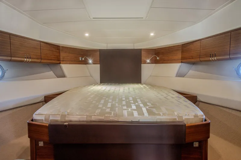 Tyma Yacht Photos Pics Luxurious cabin interior of 2019 Windy 46 Chinook yacht with elegant wood finishes.