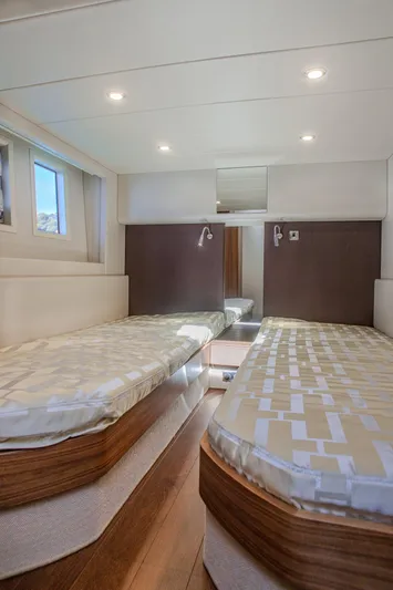 Tyma Yacht Photos Pics Interior cabin of 2019 Windy 46 Chinook with twin beds and modern design.