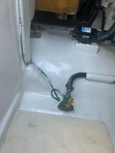  Yacht Photos Pics 2001 Cabo 35 Express boat interior with visible wiring and plumbing components.