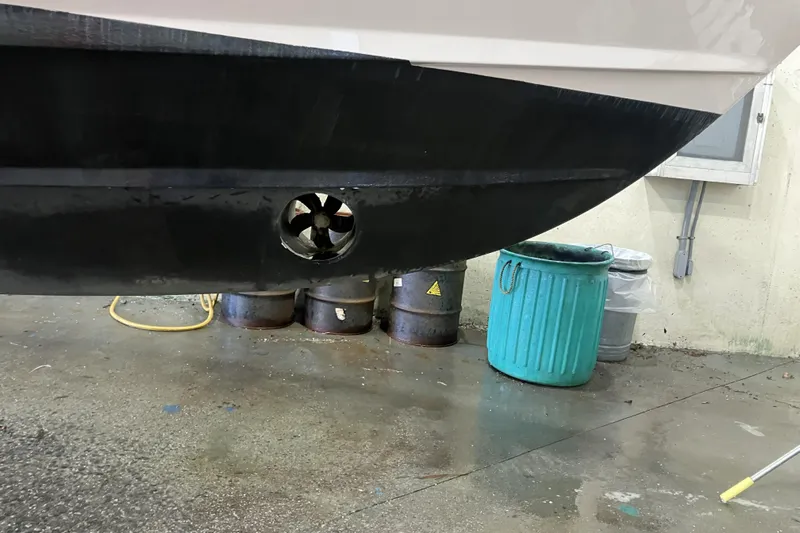  Yacht Photos Pics 2019 Grady-White Freedom 307 boat hull with thruster, in maintenance area.