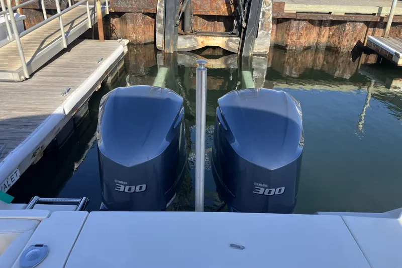  Yacht Photos Pics Twin Yamaha 300 engines on a 2019 Grady-White Freedom 307 boat at dock.