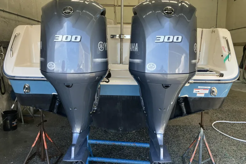  Yacht Photos Pics 2019 Grady-White Freedom 307 boat with twin Yamaha 300 engines in a garage.