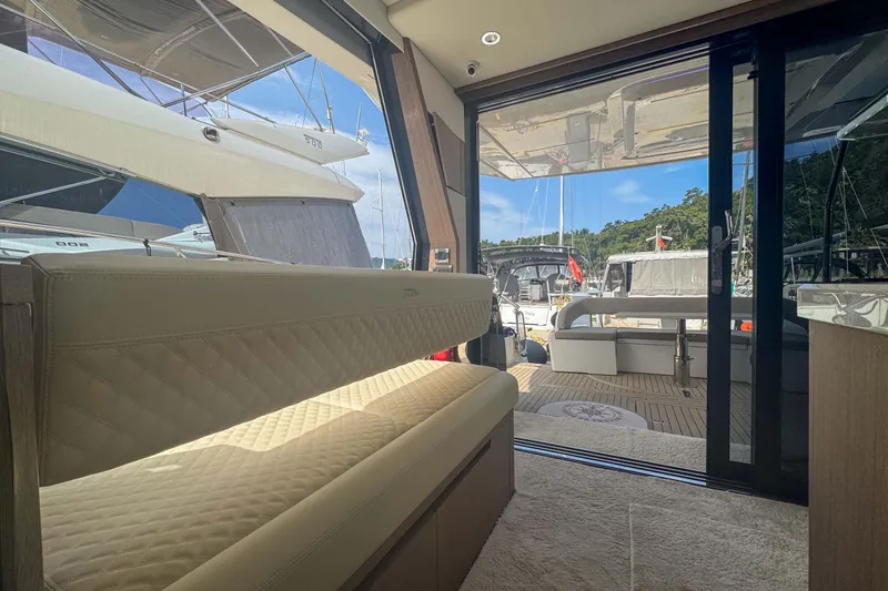Sea Star Yacht Photos Pics Interior view of 2023 Galeon 500 Fly yacht with luxurious seating and open deck.