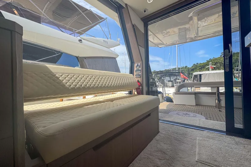 Sea Star Yacht Photos Pics Interior view of 2023 Galeon 500 Fly yacht with luxurious seating and open deck.