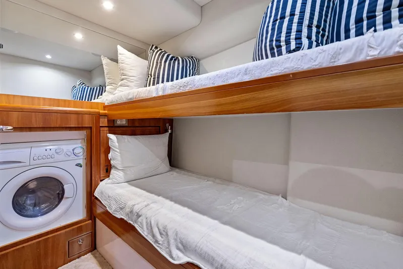 Bella Vita Yacht Photos Pics Bertram Convertible 2010 yacht interior with bunk beds and washing machine.