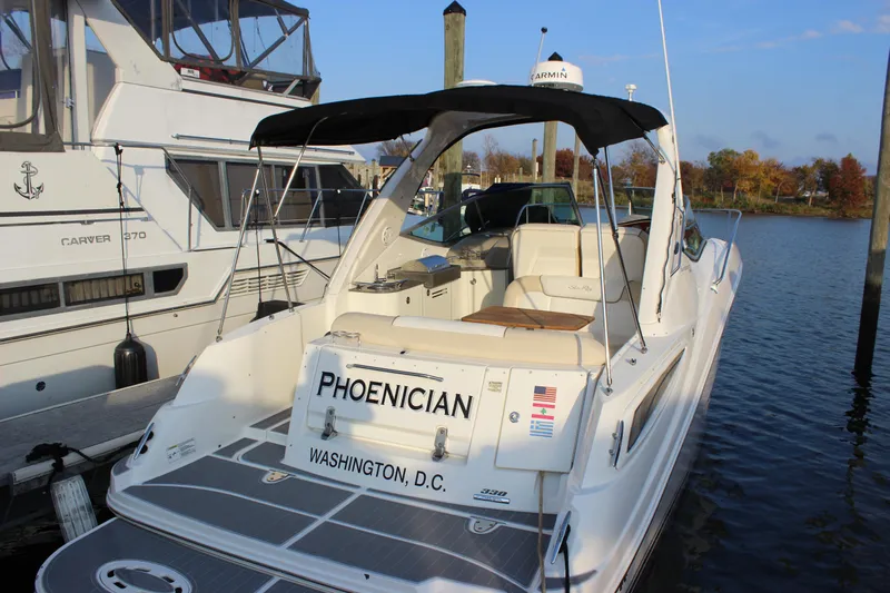  Yacht Photos Pics Sea Ray 330 Sundancer 2012 docked, rear view with "Phoenician" nameplate, Washington D.C. registration.