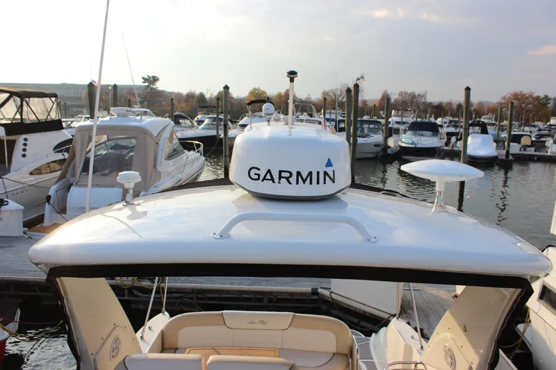  Yacht Photos Pics 2012 Sea Ray 330 Sundancer with Garmin equipment docked at a marina.
