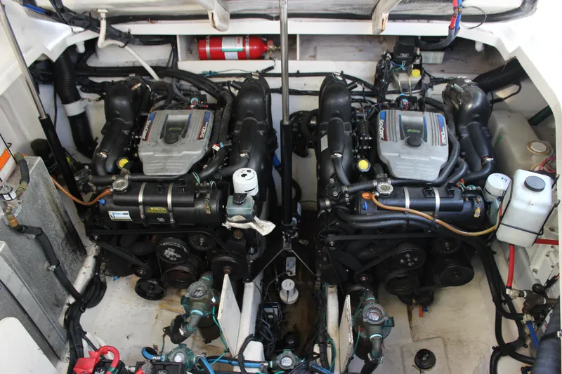  Yacht Photos Pics Engine compartment of a 2012 Sea Ray 330 Sundancer boat, featuring dual engines.
