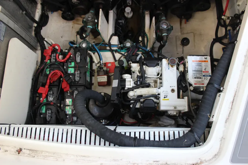  Yacht Photos Pics Engine compartment of a 2012 Sea Ray 330 Sundancer with visible batteries and components.
