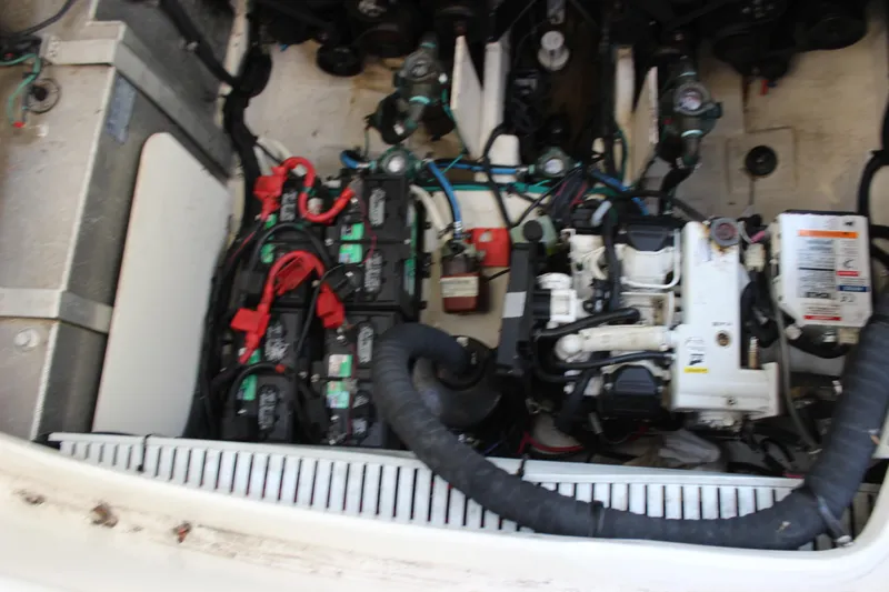  Yacht Photos Pics Engine compartment of 2012 Sea Ray 330 Sundancer with batteries and mechanical components.