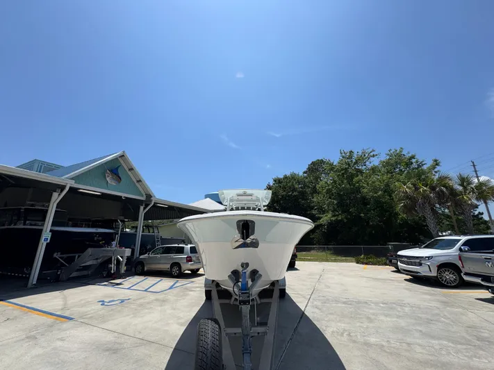  Yacht Photos Pics 2022 Sea Fox 288 Commander boat on trailer in sunny outdoor setting.