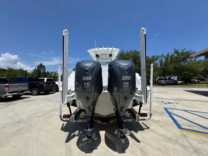  Yacht Photos Pics 2022 Sea Fox 288 Commander with twin 300 V6 engines, parked outdoors.