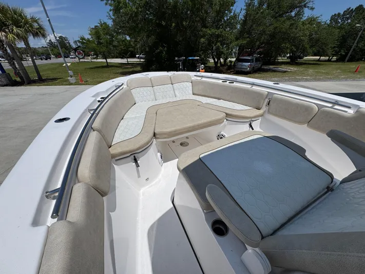  Yacht Photos Pics 2022 Sea Fox 288 Commander boat interior with cushioned seating and spacious layout.