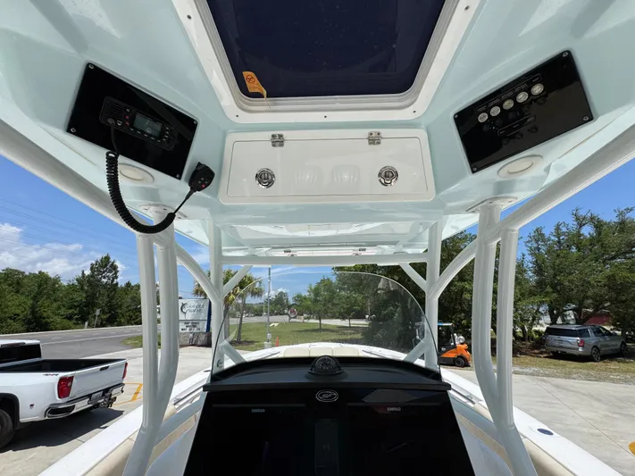  Yacht Photos Pics Interior view of 2022 Sea Fox 288 Commander boat's helm with control panels.