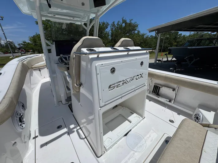  Yacht Photos Pics 2022 Sea Fox 288 Commander boat interior with seating and storage.