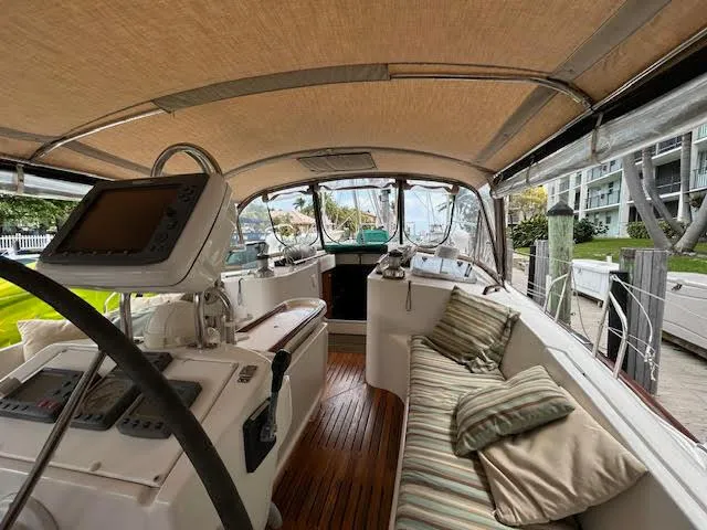 Walkabout Yacht Photos Pics 1997 Beneteau Oceanis 461 yacht interior with helm, seating, and navigation equipment.