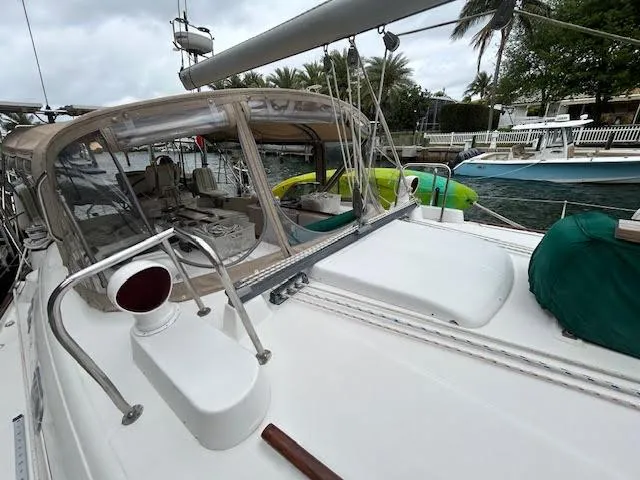 Walkabout Yacht Photos Pics 1997 Beneteau Oceanis 461 sailboat docked, featuring a spacious deck and cockpit area.