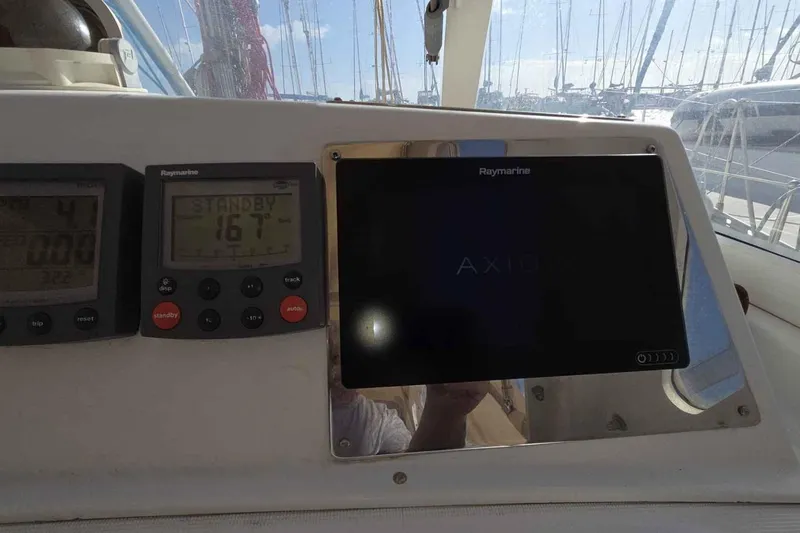 My Way Yacht Photos Pics Beneteau Oceanis 42CC 2004 yacht dashboard with Raymarine navigation equipment.