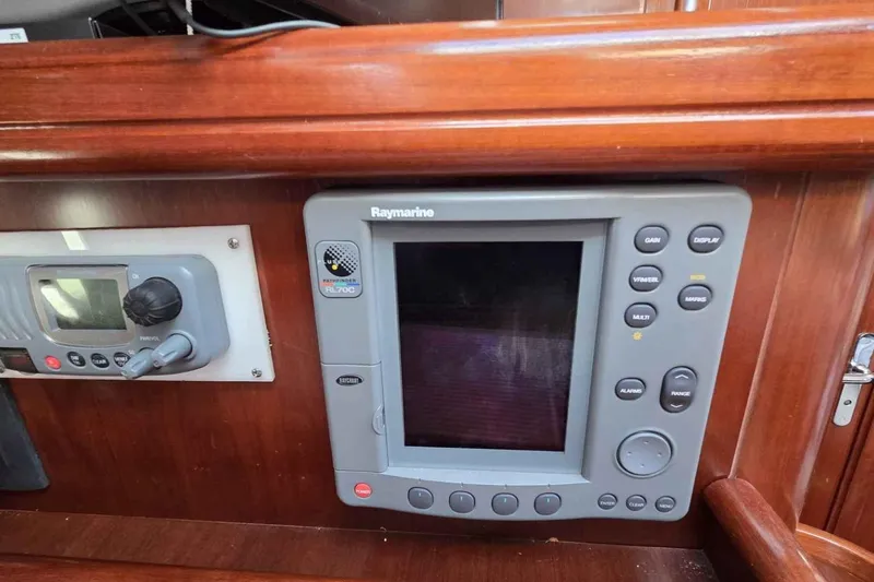 My Way Yacht Photos Pics Raymarine navigation system on 2004 Beneteau Oceanis 42CC yacht, featuring control panel and display.