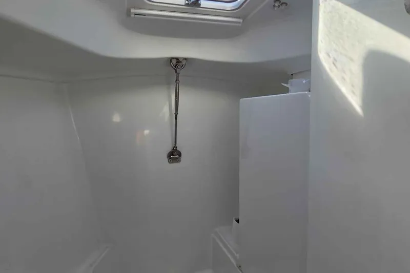 My Way Yacht Photos Pics Interior of 2004 Beneteau Oceanis 42CC sailboat, featuring a clean, white cabin space.