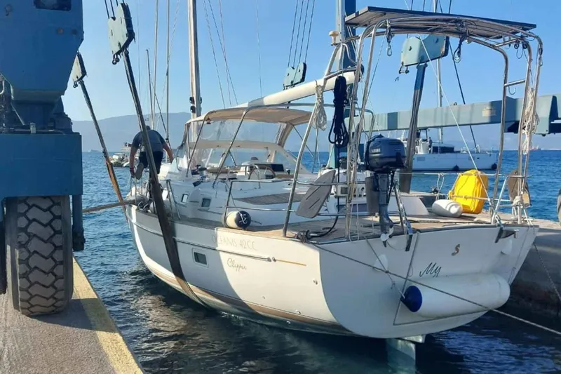 My Way Yacht Photos Pics 2004 Beneteau Oceanis Clipper 44 CC sailboat docked at marina, rear view.