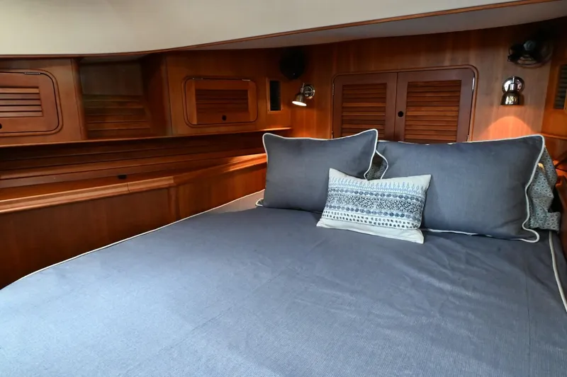 Carol Anne Yacht Photos Pics Luxurious cabin interior of 2007 Hinckley Talaria 44 MY with elegant wood finish.