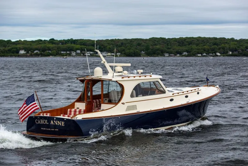 Carol Anne Yacht Photos Pics 2007 Hinckley Talaria 44 MY yacht cruising on a scenic waterway.