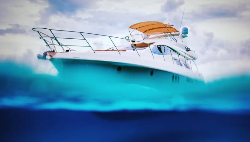 Belle Yacht Photos Pics 2004 Azimut 55E yacht on ocean, partially submerged view.