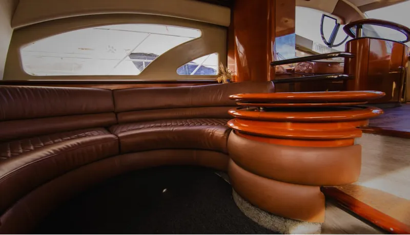 Belle Yacht Photos Pics Luxurious interior of a 2004 Azimut 55E yacht with elegant leather seating.