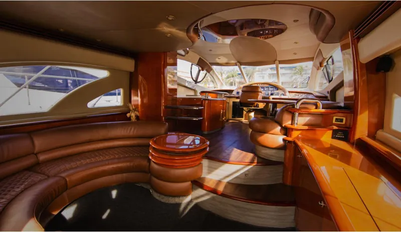 Belle Yacht Photos Pics Luxurious interior of a 2004 Azimut 55E yacht with elegant wood and leather finishes.