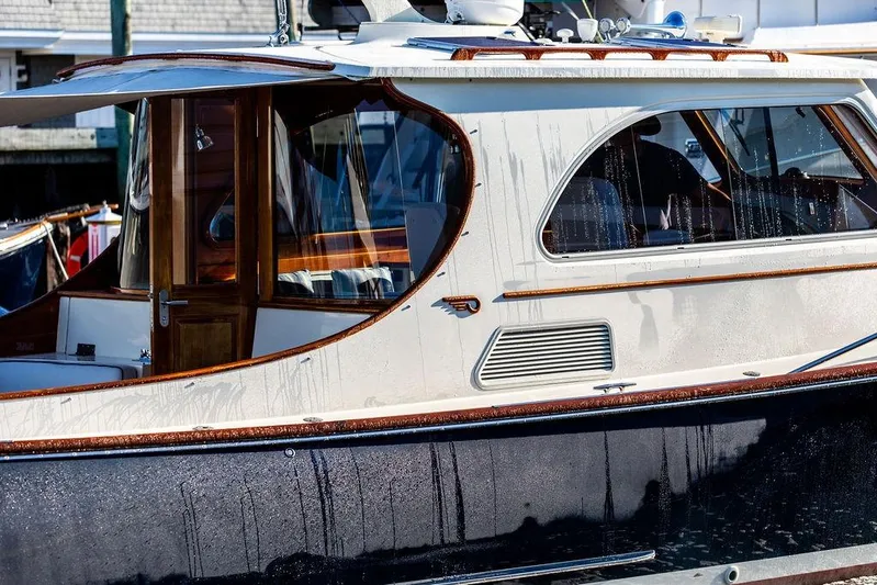 Mon Amour Yacht Photos Pics 2005 Hinckley Talaria 44 yacht with elegant wooden accents and sleek design.