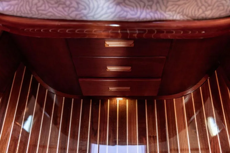 Mon Amour Yacht Photos Pics Luxurious wood interior of 2005 Hinckley Talaria 44 yacht with polished flooring.