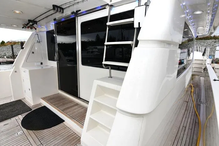  Yacht Photos Pics 2001 Symbol Raised Pilothouse Motoryacht deck with sleek design and modern amenities.