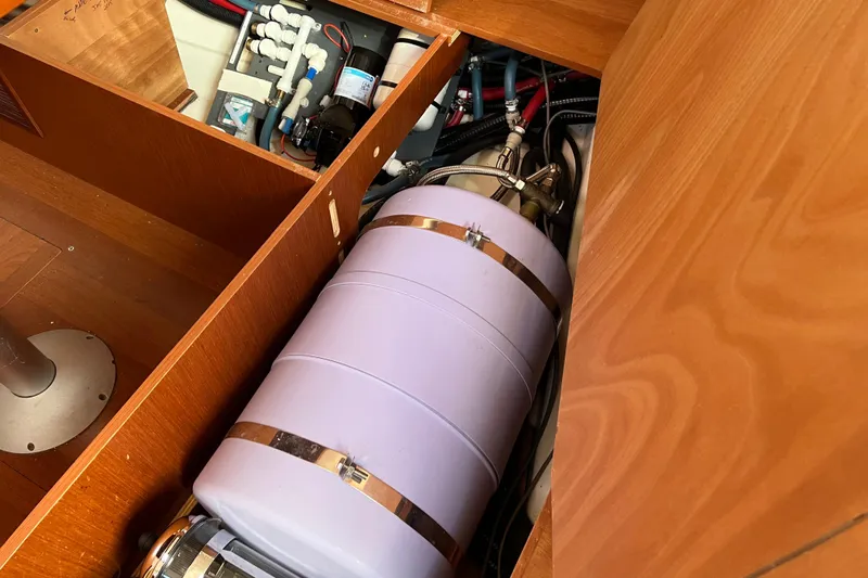 Adattare Yacht Photos Pics Beneteau Oceanis 45 (2012) interior showing mechanical components and storage area.