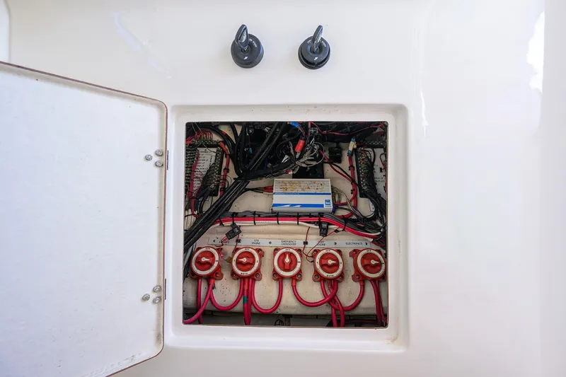  Yacht Photos Pics Electrical panel of a 2005 Venture 34 Center Console boat with wiring and switches.