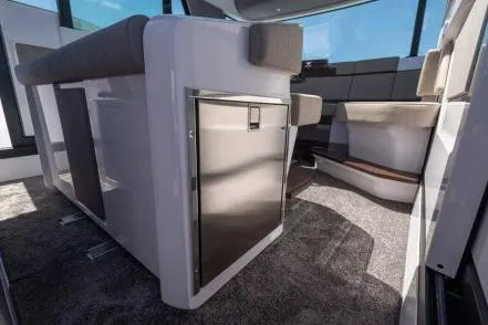  Yacht Photos Pics 2025 Axopar 45 XC Cross Cabin interior with modern seating and sleek design.