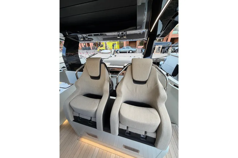 Kawa Yacht Photos Pics 2023 SACS Rebel 55 luxury boat interior with two plush seats.