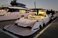 2022 Solaris Power 44 Open yacht docked at sunset, showcasing sleek design and luxury features.