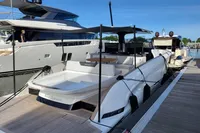 2022 Solaris Power 44 Open yacht docked at marina, showcasing sleek design and spacious deck.