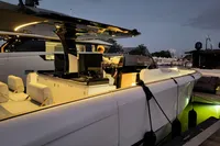 2022 Solaris Power 44 Open yacht docked at sunset, featuring sleek design and modern amenities.