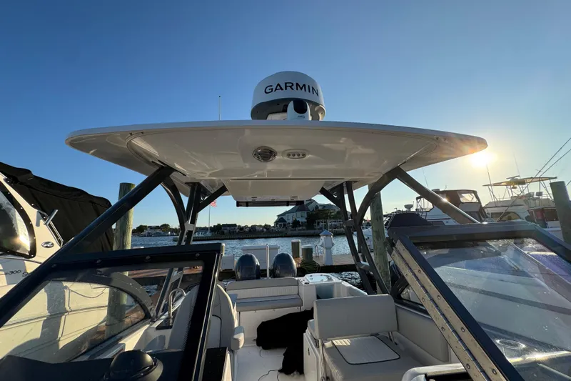  Yacht Photos Pics 2023 Sea Fox 268 Traveler boat with Garmin radar, docked at sunset.