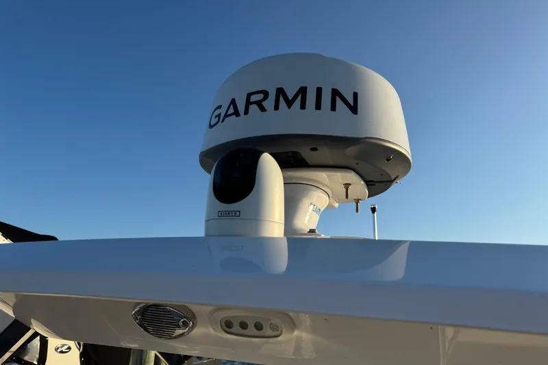  Yacht Photos Pics 2023 Sea Fox 268 Traveler boat with Garmin radar system under clear blue sky.