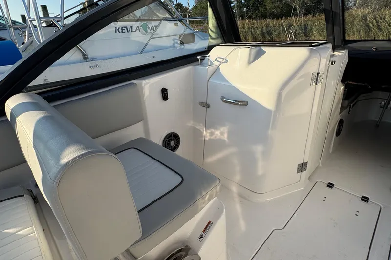  Yacht Photos Pics 2023 Sea Fox 268 Traveler interior with seating and storage compartment.