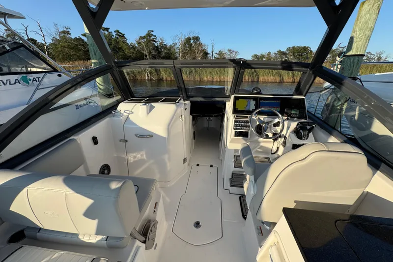  Yacht Photos Pics 2023 Sea Fox 268 Traveler boat interior with modern helm and seating.