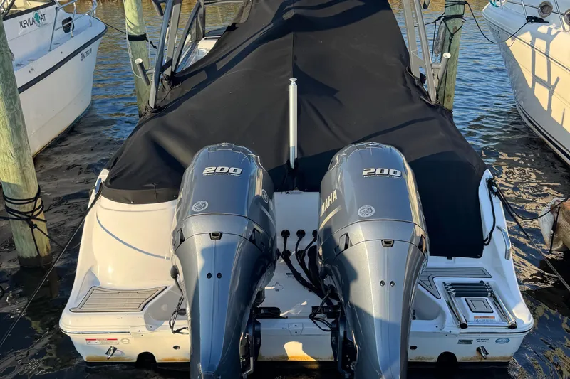  Yacht Photos Pics 2023 Sea Fox 268 Traveler with twin Yamaha 200 engines, docked and covered.