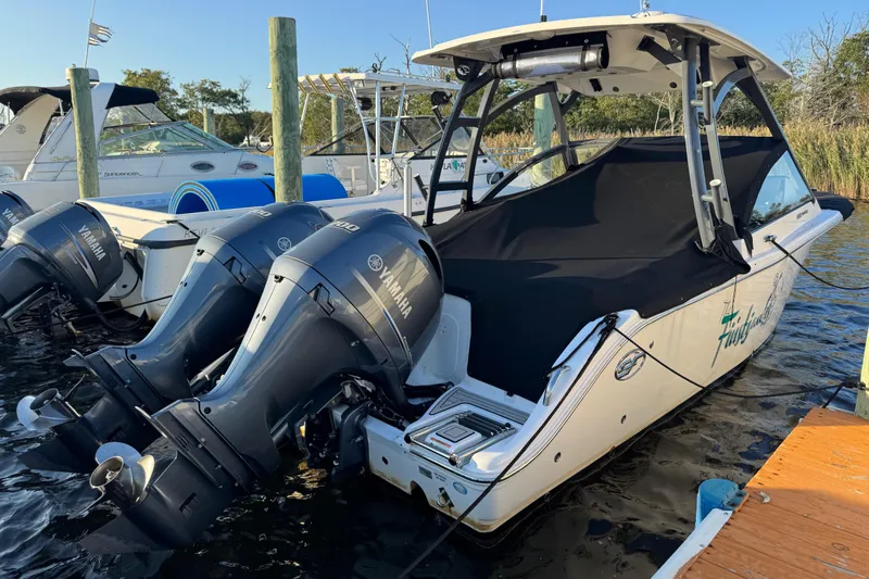  Yacht Photos Pics 2023 Sea Fox 268 Traveler boat docked with twin Yamaha outboard engines.